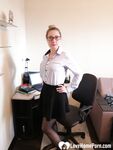 Office worker in black stockings shows her goods - Photo #1