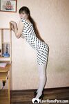 Mature hottie strips into sexy white stockings - Photo #2