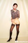 Gagged babe in stockings spreading her pussy - Photo #12