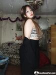 Perfect Asian sweetie removes her sexy skirt - Photo #4