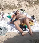 Beach nudists caught by voyeur hidden cam - Photo #20