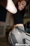 Beautiful redhead babe posing around her apartment - Photo #14
