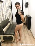 Kinky brunette taking pics while stripping her clothes - Photo #12