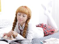 Redhead schoolgirl handles two completely erect peckers - Photo #2
