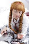 Redhead schoolgirl handles two completely erect peckers - Photo #3