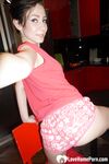 Beautiful teen strips off everything but her socks - Photo #16