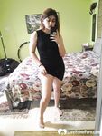 Naughty brunette strips off her black dress - Photo #11