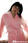 Brunette removes her bathrobe to reveal everything - Photo #1