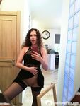 Kinky cutie trying on some black lingerie - Photo #11