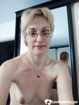 Stunning MILF puts on a yellow dress - Photo #9