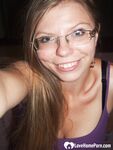 Brunette teacher with glasses shows off her boobs - Photo #13