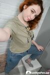 Stunning redhead in stockings shows off her ass - Photo #5