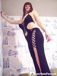 MILF in a seductive purple dress fooling around - Photo #19