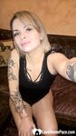 Cute tattooed beauty flashes her amazing tits - Photo #12
