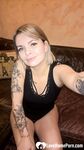 Cute tattooed beauty flashes her amazing tits - Photo #13