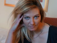 Blonde amateur Vanessa uncovers her big tits while going topless in stockings - Photo #2