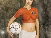 Young Asian girl with a great tits models naked covered in bodypaint - Photo #3
