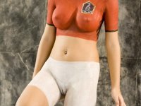 Young Asian girl with a great tits models naked covered in bodypaint - Photo #8