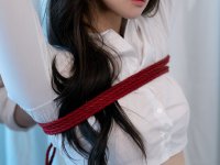 Submissive South Korean model strips totally naked during a BDSM performance - Photo #10