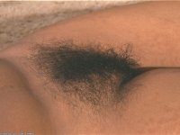 Chubby ebony beauty uncovers her big tits before showing her bush - Photo #10
