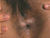 Chubby ebony beauty uncovers her big tits before showing her bush - Photo #15