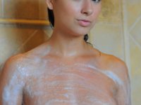 Amateur girl wraps up a nude shower with a towel in her hand - Photo #6
