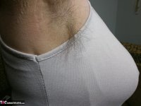 Horny granny Caro in high heels flaunting hairy armpits & mature ass - Photo #4