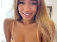 Petite Asian babe Clara Trinity shows her lickable shaved pussy up close - Photo #6