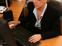 Mature blonde secretary Lauren E exposes her big ass and twat in stockings - Photo #1