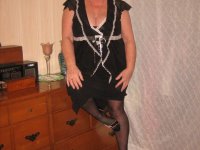 Overweight nan Girdle Goddess strips to her footwear in front of a dresser - Photo #1