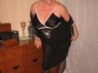Overweight nan Girdle Goddess strips to her footwear in front of a dresser - Photo #5