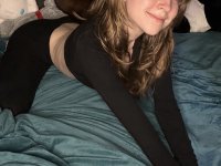 Sweet teen with a gap in her front teeth shows her underwear on a bed - Photo #2