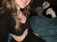 Sweet teen with a gap in her front teeth shows her underwear on a bed - Photo #10