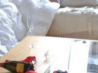 Gorgeous blonde Chikita dons her lingerie after getting drunk the night before - Photo #1
