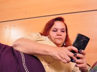 Slutty curvaceous granny Brenda undresses and toys her bald snatch - Photo #1
