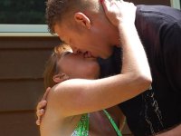 Older redhead amateur Dee Delmar bangs one guy then another behind her house - Photo #2