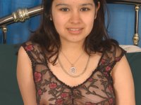 Latina cutie showcases her pussy after playing with her exposed nipples - Photo #1
