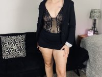 Older woman Lil Ms Muffet takes off her clothes while wearing glasses and heels - Photo #3