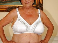 Fatty granny in lingerie gets naked to show her wet cunt - Photo #2
