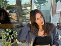 Nerdy amateur babe Emily teases with her hot ass in sexy tights - Photo #1