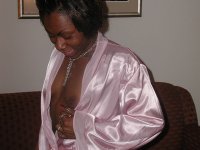 Brunette ebony Colette teases with her round ass and plays with a toy - Photo #1