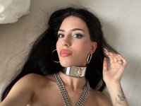 Hot brunette Kore Fox models fetish wear during a solo engagement - Photo #4