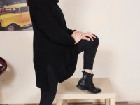 Clothed female Petra removes her boots and socks to show her pretty feet - Photo #3