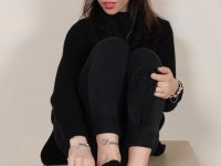 Clothed female Petra removes her boots and socks to show her pretty feet - Photo #8