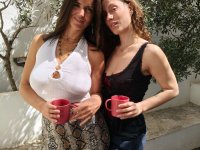 Beautiful lesbians Sofi L and Calita show off their tits and lick pussy - Photo #8