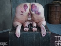 Fat chick undergoes extreme torture session and bruising in a dungeon - Photo #11
