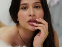 Latina solo girl exposes her tits and pussy while seated on a sofa - Photo #12
