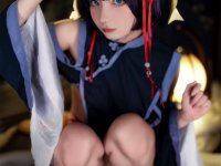 Asian cosplayer strikes tempting poses during a solo performance - Photo #5