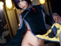 Asian cosplayer strikes tempting poses during a solo performance - Photo #8