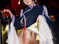 Asian cosplayer strikes tempting poses during a solo performance - Photo #9